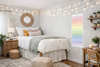 Cozy bedroom with string lights, bed, nightstands, and decor